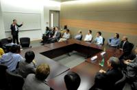 Prof. Shen Yan (left standing) shares his idea with our investigators during the meeting